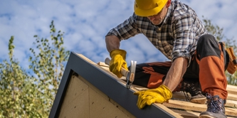 A person working on a roof