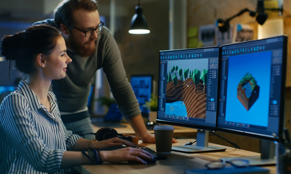 2 people looking at a computer screen